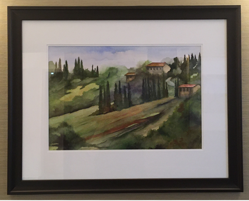 Image of picture of hillside on wall